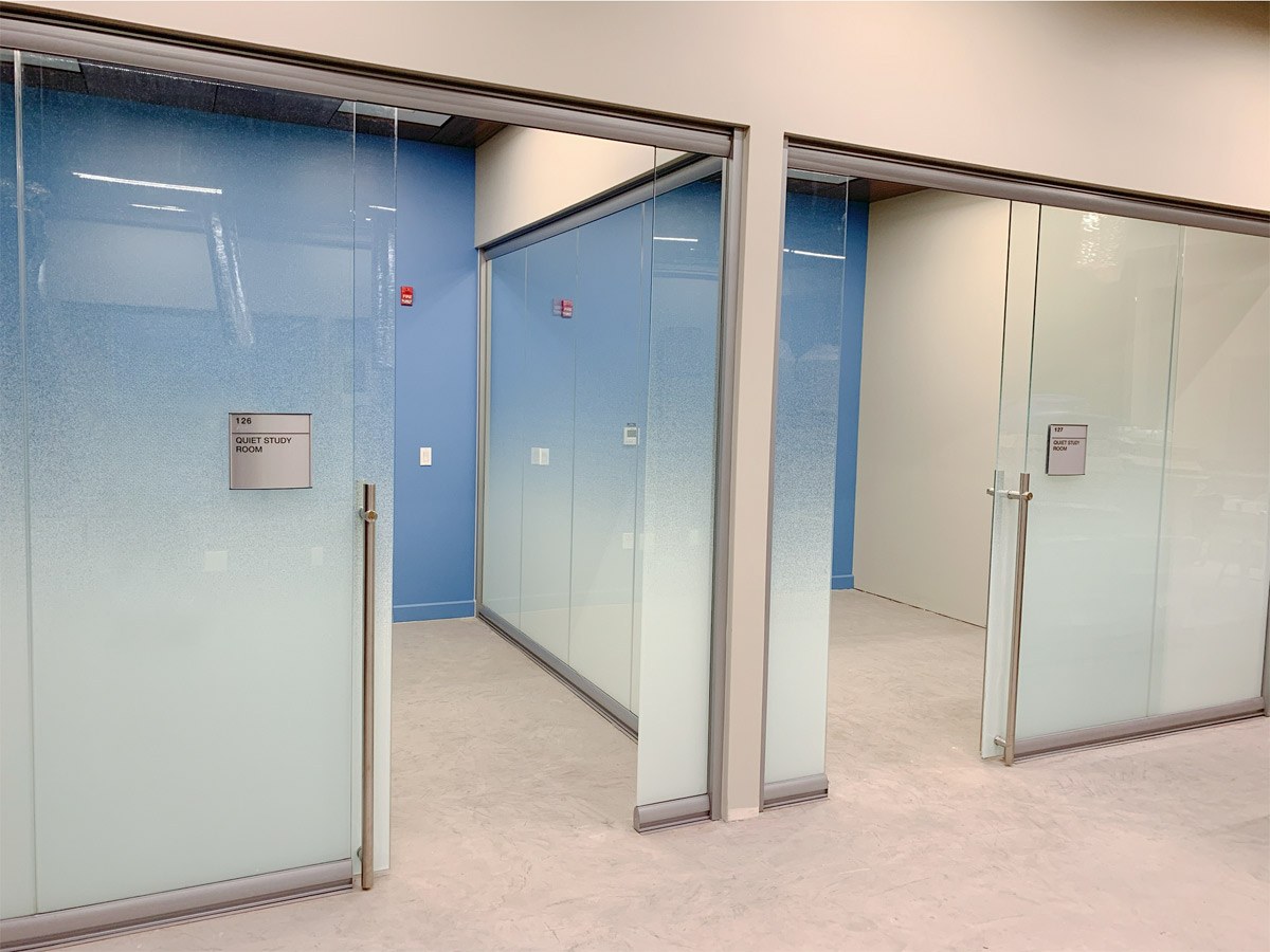 NXT Wall View Series frosted glass private offices with sliding doors