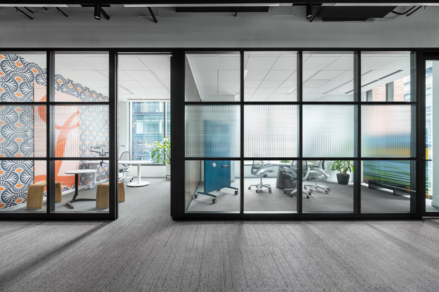 Fellowes Titan glass wall frame and tile panel configuration